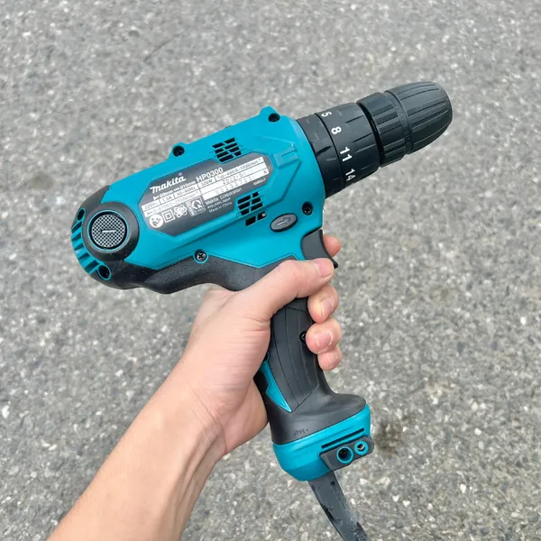 Máy khoan búa và vặn vít makita hp0300 10mm - 2