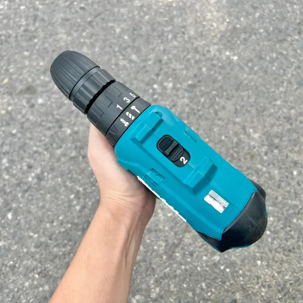 Máy khoan búa và vặn vít makita hp0300 10mm - 5